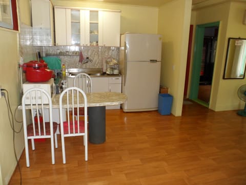 Condo, 3 Bedrooms | Private kitchen | Mini-fridge, microwave, coffee/tea maker, electric kettle