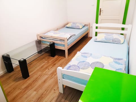 Room, 2 Twin Beds, Non Smoking, Shared Bathroom | Laptop workspace, free WiFi, bed sheets