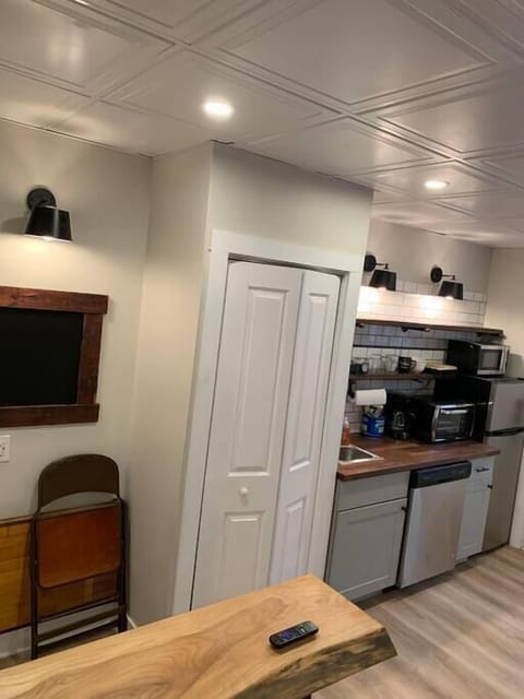 A shot of the kitchenette and workspace wall. 