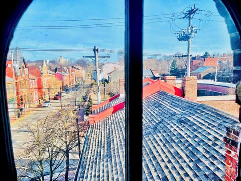 The windows in this bedroom gently filter in natural light