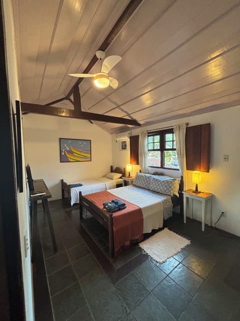 Classic Triple Room, Multiple Beds | Minibar, free WiFi, bed sheets