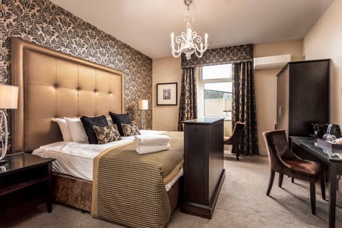 Signature Suite | Premium bedding, individually decorated, individually furnished, desk