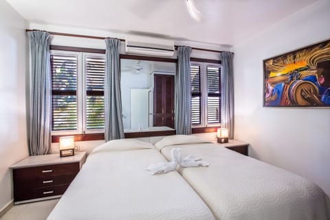 Apartment, Ocean View, Beachfront | In-room safe, iron/ironing board, free WiFi, bed sheets