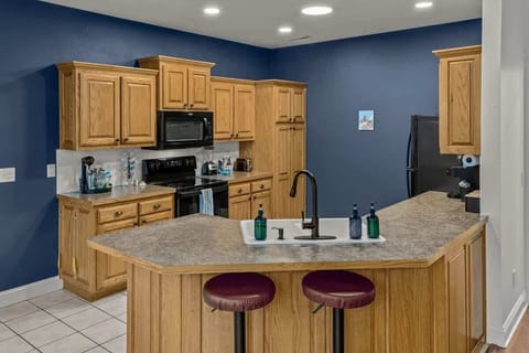 Cook like a pro in the fully stocked kitchen—stainless appliances, drip & Keurig coffee makers, plentiful cookware and spacious counters.