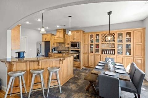 Open-concept kitchen and dining area—share meals and conversations with the whole group