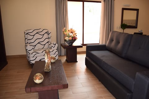 Deluxe Suite, Mixed Dorm | Living area | TV