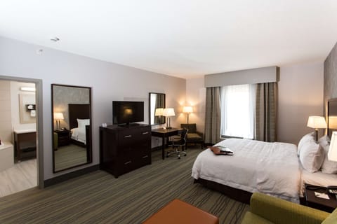 Studio Suite, 1 King Bed (Whirlpool) | In-room safe, desk, laptop workspace, blackout drapes