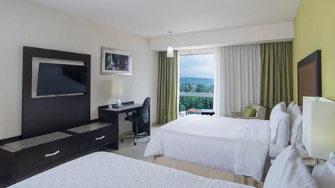 Standard Room, 2 Queen Beds, City View | Down comforters, in-room safe, desk, blackout drapes