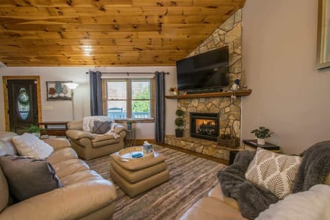 Keep yourself warm and comfy in this Living room while watching your favorite TV shows.