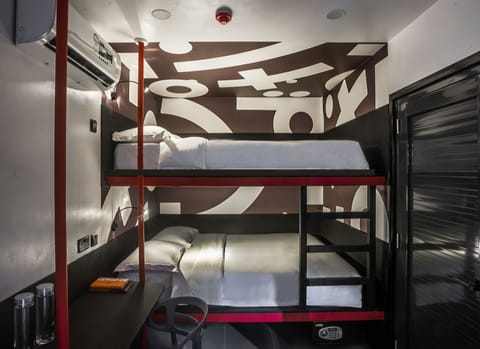 Standard Quad | Pillowtop beds, desk, free WiFi, bed sheets