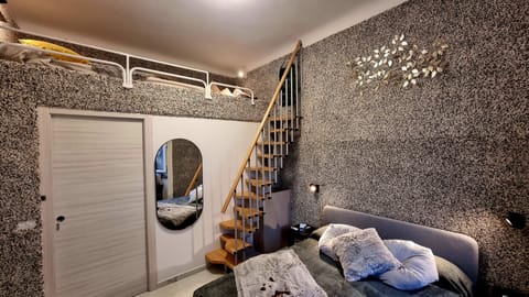 Exclusive Triple Room, City View | Desk, laptop workspace, blackout drapes, free WiFi