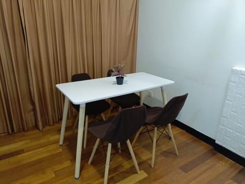 Superior Studio Suite | Living area | Flat-screen TV