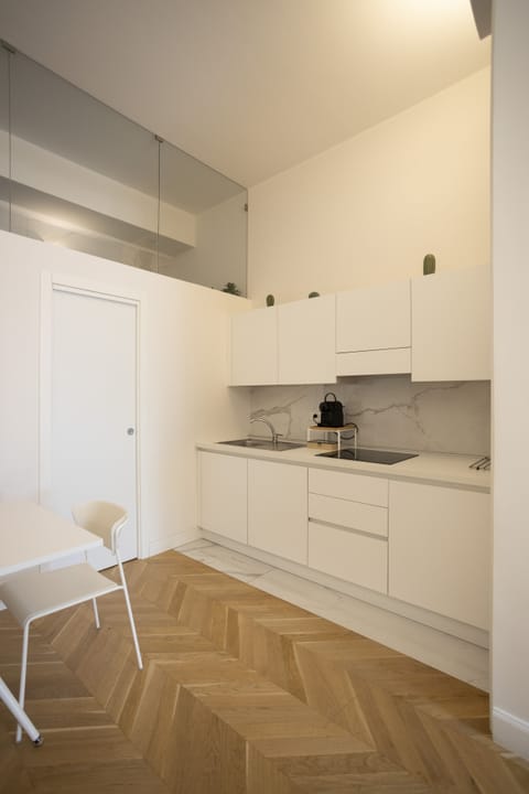 Deluxe Apartment | Private kitchen | Full-size fridge, oven, stovetop, espresso maker