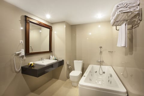 Executive Suite | Bathroom | Designer toiletries, hair dryer, slippers, towels