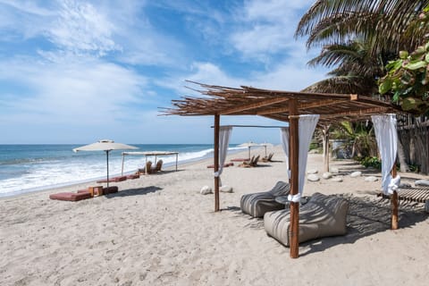 Private beach, white sand, beach umbrellas, beach towels