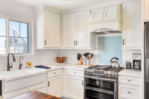 Gas range and a coffee nook.