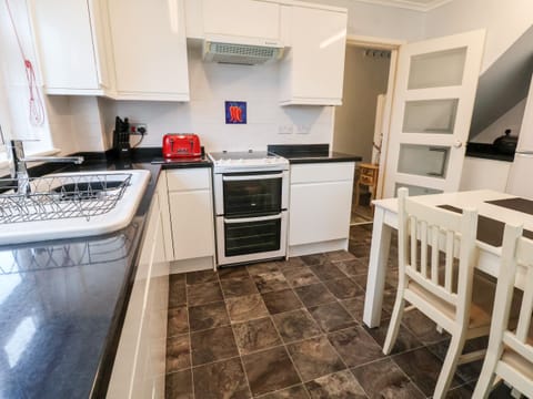 Fridge, electric kettle, toaster, cookware/dishes/utensils