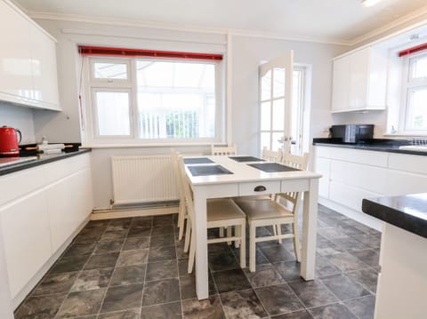 Fridge, electric kettle, toaster, cookware/dishes/utensils