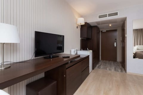 A view from the bedroom highlighting its open layout and well-organized furnishings.
