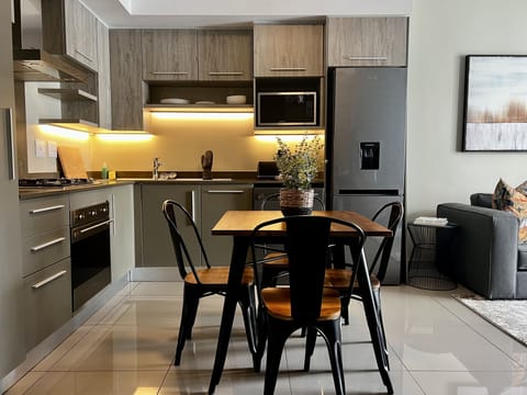 Grand Apartment | Private kitchen | Fridge, microwave, oven, stovetop