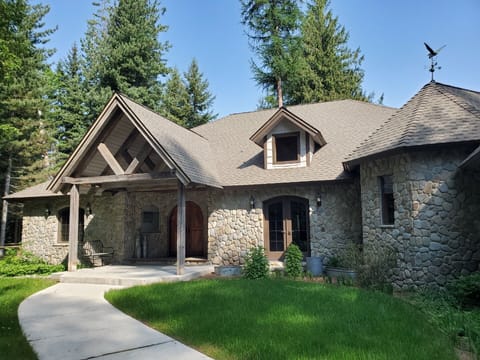 View from driveway - Beautiful Craftsman style home. Warm and inviting!