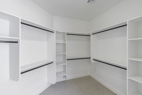 Main Bedroom Walk-in Closet - This main closet provides a ton of space for all your luggage!