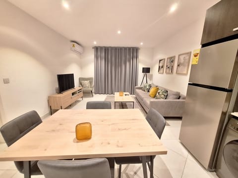 Executive Apartment | Living area | TV
