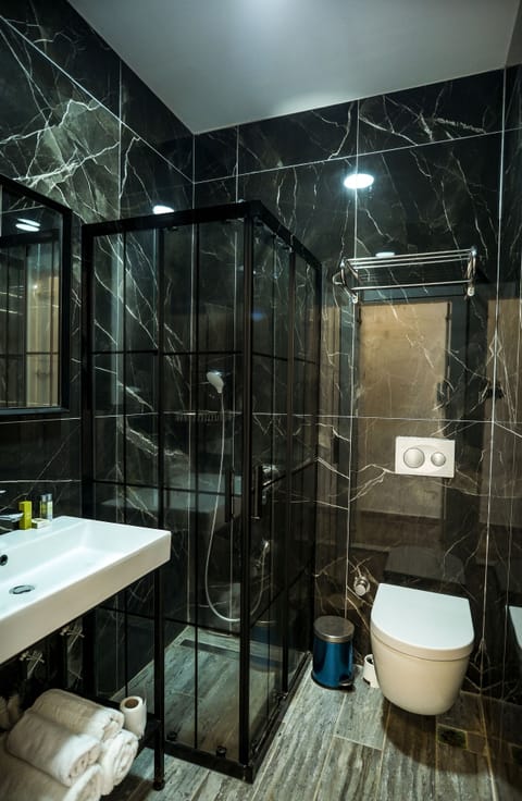 Standard Room, Pool View | Bathroom | Shower, hair dryer, slippers, towels