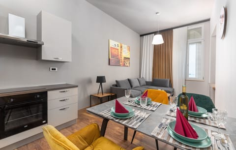 Luxury Apartment | Living area | 50-inch Smart TV with satellite channels, TV