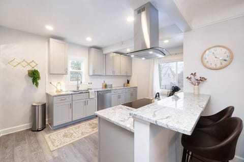 Cook in style with stainless steel appliances, granite countertops, and a spacious layout. The breakfast bar is perfect for coffee chats or casual dining.