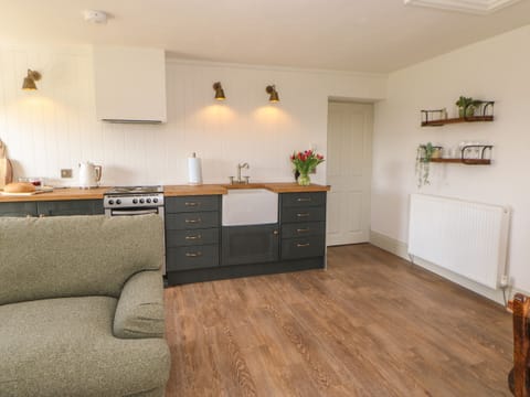 Fridge, electric kettle, toaster, cookware/dishes/utensils