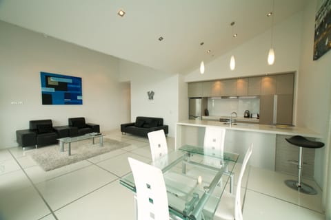 Penthouse Four | Living area | Flat-screen TV