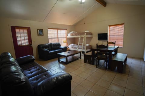Living + dining area with bunk beds