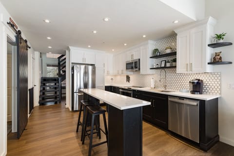 Fully Stocked Kitchen with Kitchen Island and Seating (Unit #768)