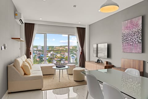 Deluxe Apartment, 1 Bedroom, Balcony, City View | Minibar, in-room safe, desk, laptop workspace