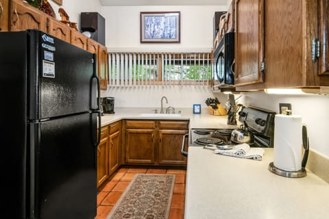 Condo, 2 Bedrooms | Private kitchen | Fridge, oven, coffee/tea maker, toaster