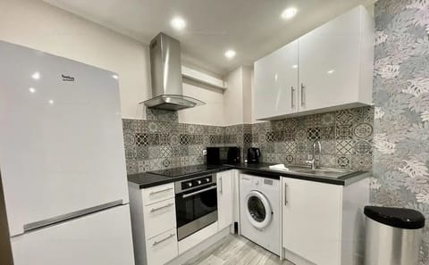 Design Apartment | Private kitchen | Full-size fridge, microwave, oven, stovetop