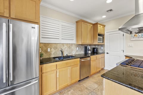 Open Concept Living Area with Living Room, Dining Room & Kitchen all connected.