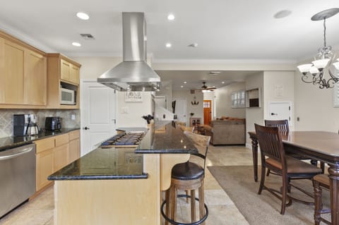 Open Concept Living Area with Living Room, Dining Room & Kitchen all connected.