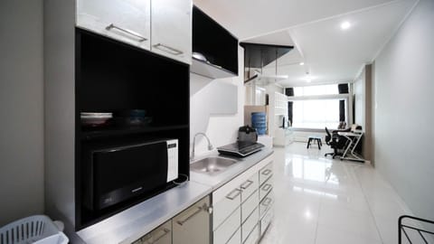 Apartment, 1 Bedroom | Private kitchen | Full-size fridge, stovetop