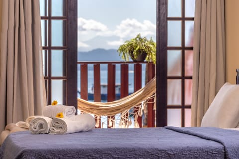 Family Room | Desk, bed sheets