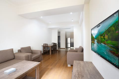 Basic Apartment | Living area | Flat-screen TV