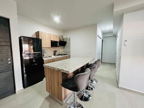 Bluu Lagoon 305 | Private kitchen | Full-size fridge, microwave, stovetop, blender