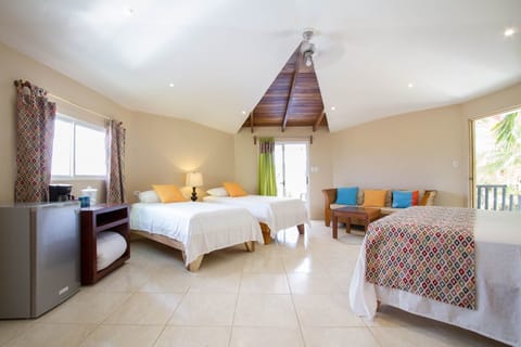 Suite, 2 Bedrooms, Poolside | Living area | 30-inch LCD TV with digital channels