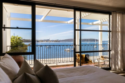 Waterfront First Floor Room | Minibar, individually decorated, individually furnished