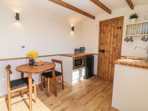 Fridge, toaster, cookware/dishes/utensils