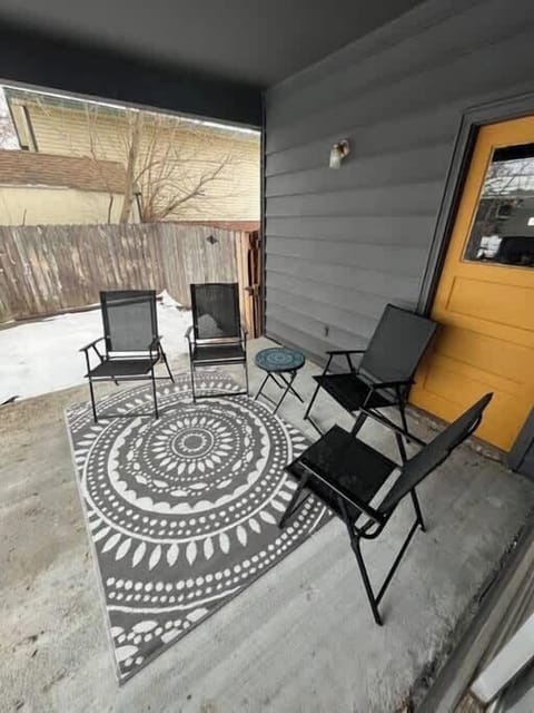 Relax and unwind in the outdoor seating area, perfect for enjoying your morning coffee, reading a book, or sipping a glass of wine in the evening. This inviting space offers comfortable seating and a peaceful atmosphere to make the most of your stay.