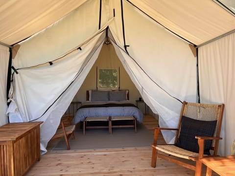 Comfort Tent | Premium bedding, individually furnished, free WiFi, bed sheets