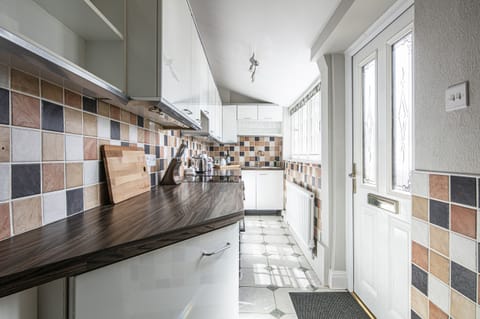 Fridge, electric kettle, toaster, cookware/dishes/utensils