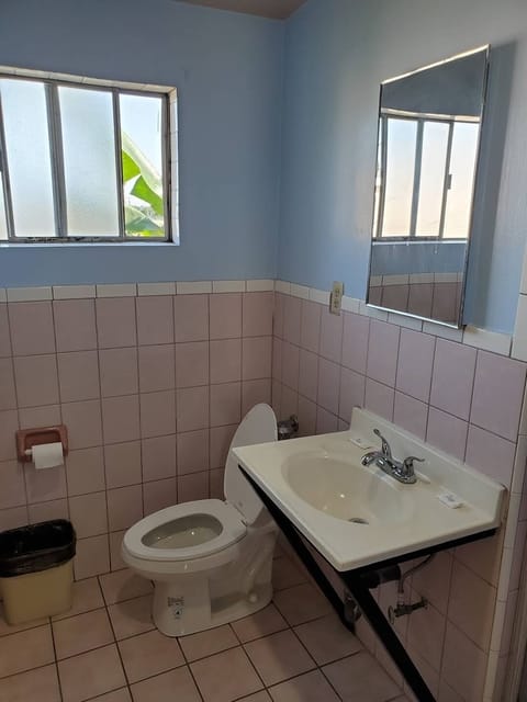 Comfort Room | Bathroom | Rainfall showerhead, designer toiletries, towels